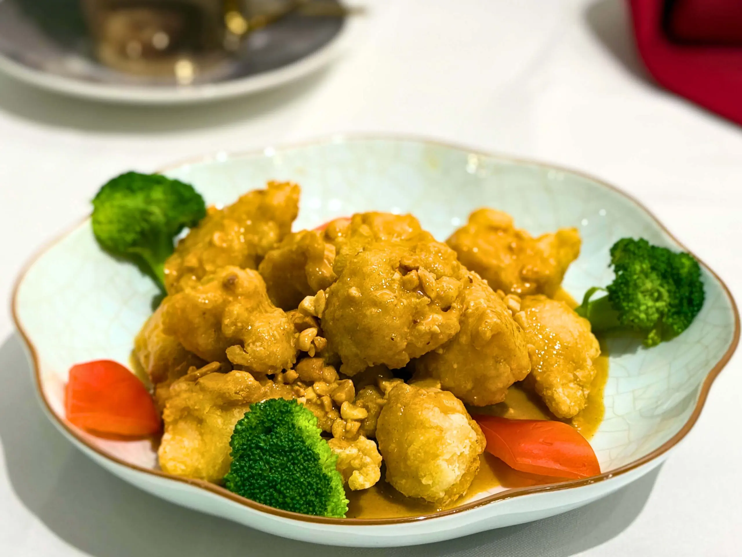 Tender chicken with peanuts and curry sauce at Big 8, a Chinese Restaurant in Lincoln